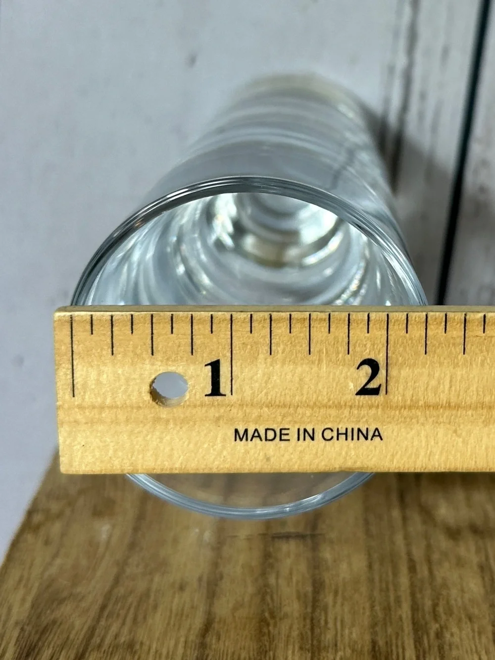 Masonic shot glass featuring laser-etched emblems of Freemasonry